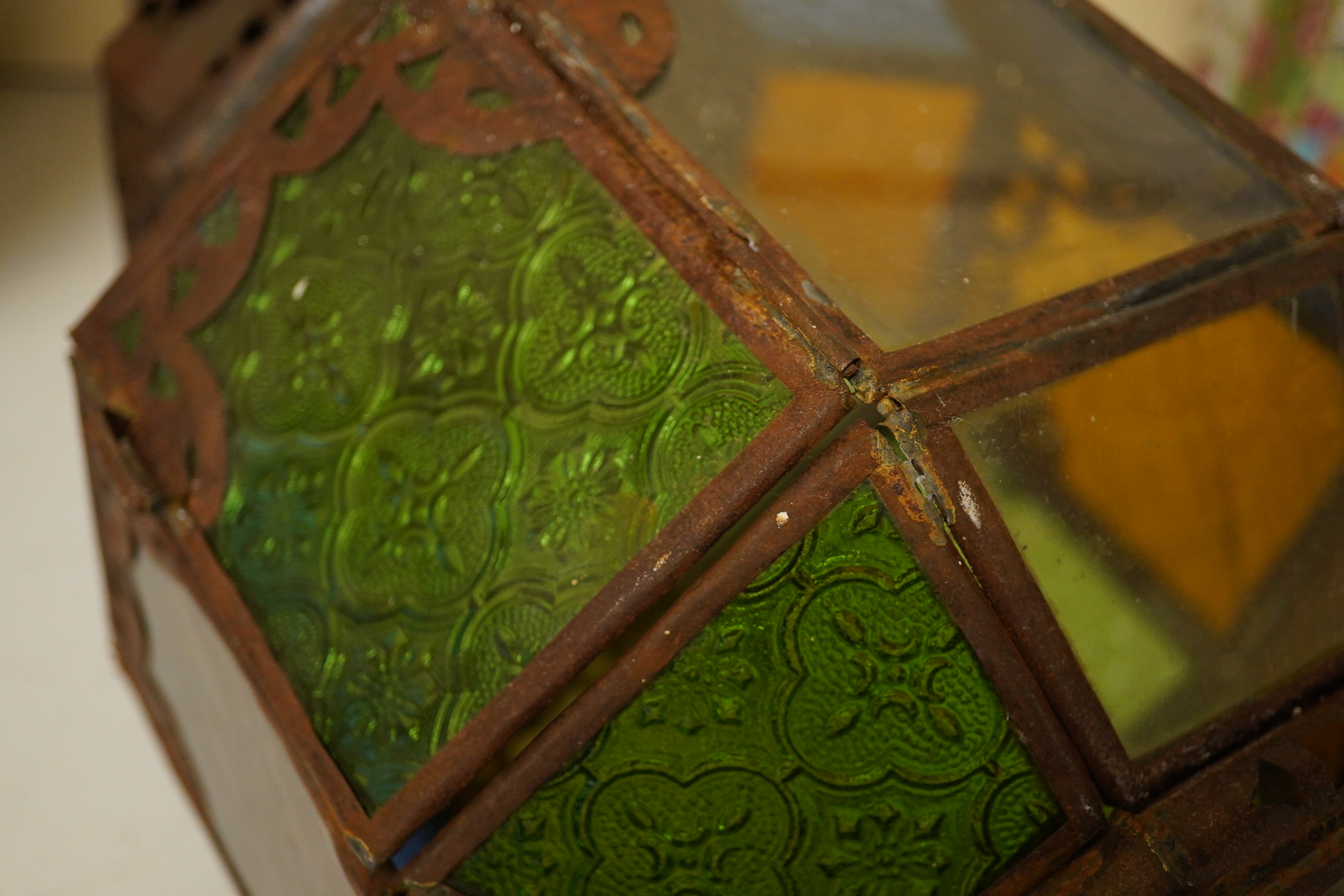 A Moorish coloured glass and tinplate lantern, 50cm high. Condition - poor